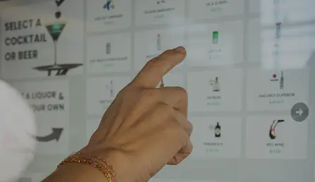 example of guest using a tendedbar touchscreen