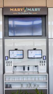 TendedBar automated countertop beverage dispenser installed on wood counter, clean commercial installation
